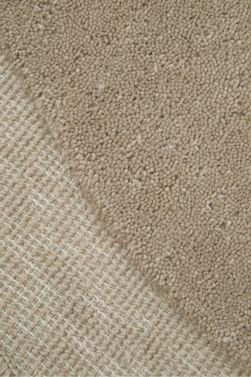 Cleo Latte Rug featuring soft curved gradient in cream, beige and taupe on light latte background, hand-tufted wool blend