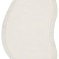 Cleo Milk Rug featuring a soft oval shape in cream with a lighter border on a neutral background