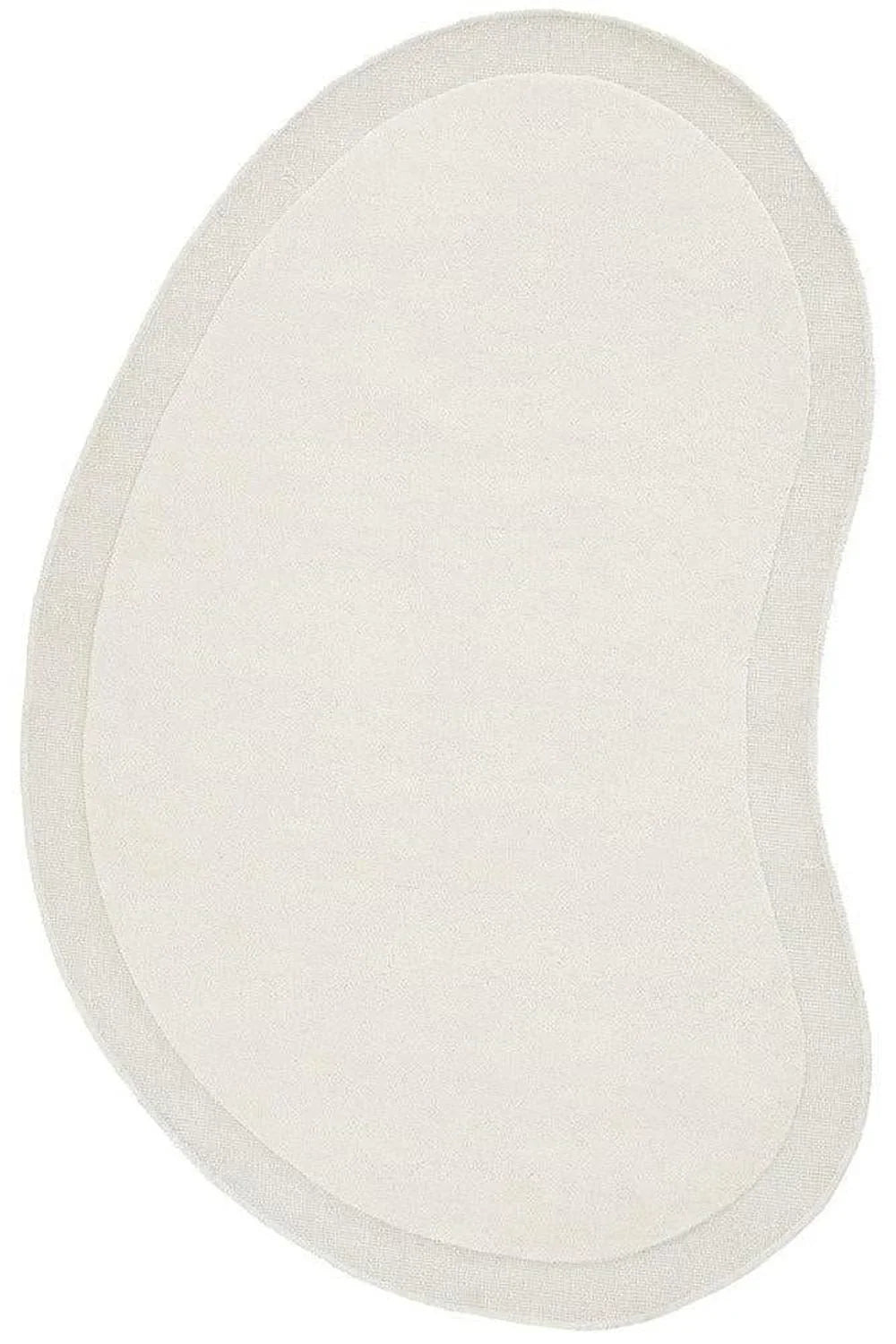 Cleo Milk Rug featuring a soft oval shape in cream with a lighter border on a neutral background