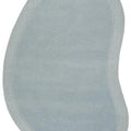 Cleo Sky Rug featuring abstract curved design in powder blue and light grey on white background, hand-tufted wool