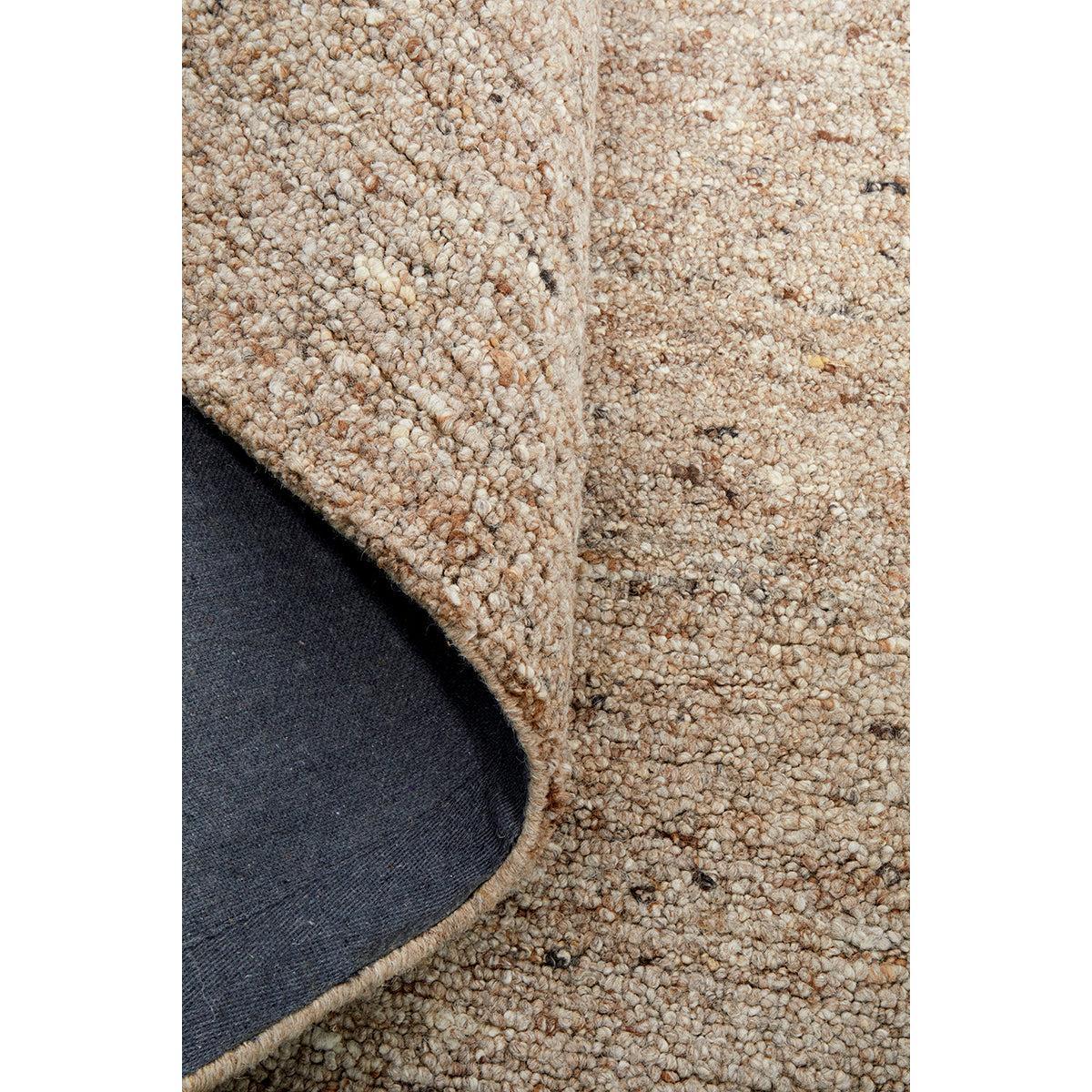 Conscious Loom Embrace Beige Runner Rug with textured shaggy boucle in cream and taupe on white background, tufted wool