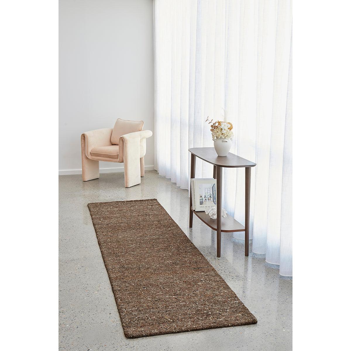 Conscious Loom Embrace Brown Runner Rug with textured weave in dark chocolate, tan and camel on light grey, woven fibre