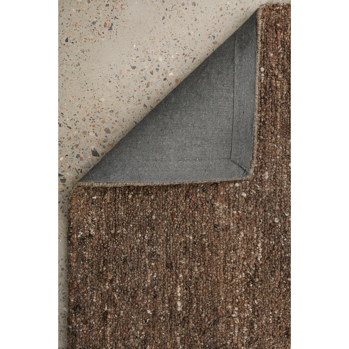 Conscious Loom Embrace Brown Runner Rug featuring textured brown shag with beige flecks on grey floor, machine-made wool