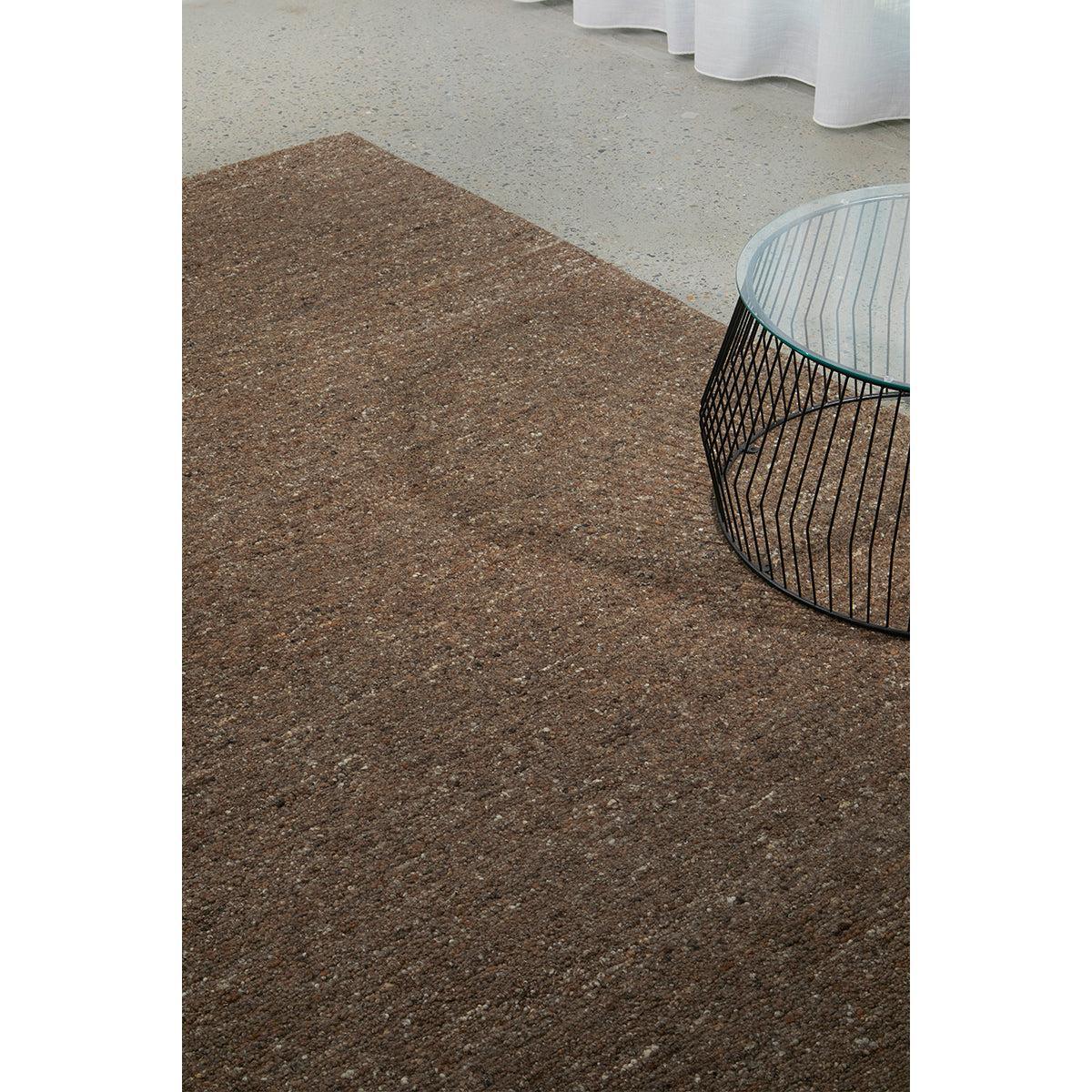 Conscious Loom Embrace Brown Rug featuring textured pattern in chocolate brown, beige and tan on grey, hand-woven wool