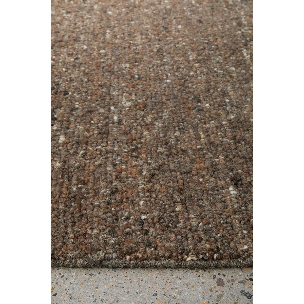 Conscious Loom Embrace Brown Rug featuring shaggy pile in dark chocolate brown, brown and beige on warm beige background