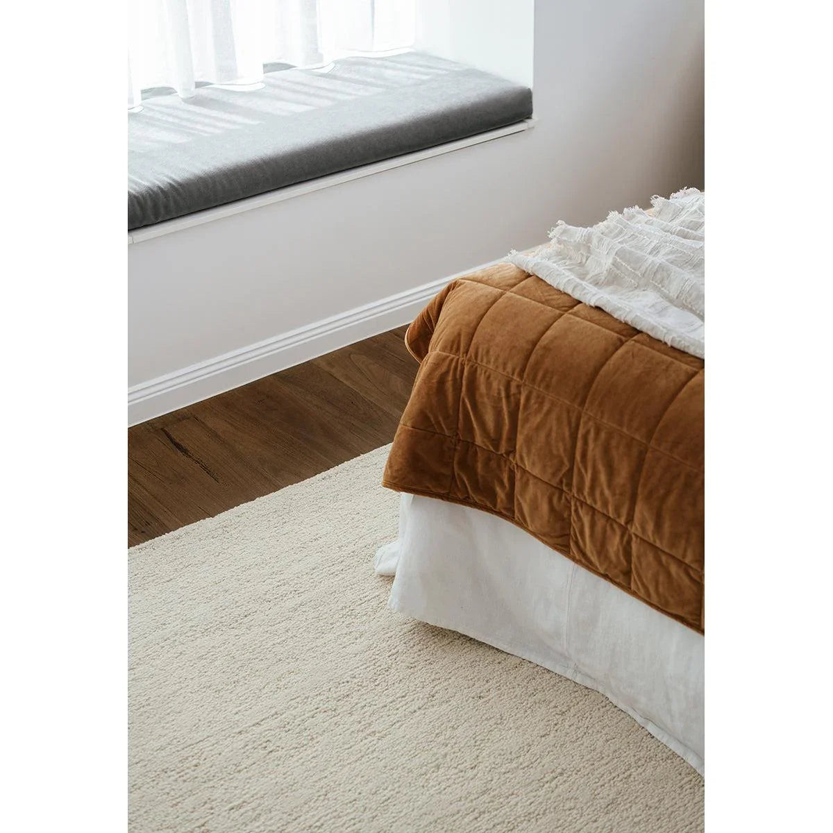 Conscious Loom Embrace Cream Rug featuring solid plush texture in cream, ivory and beige on cream background tufted wool
