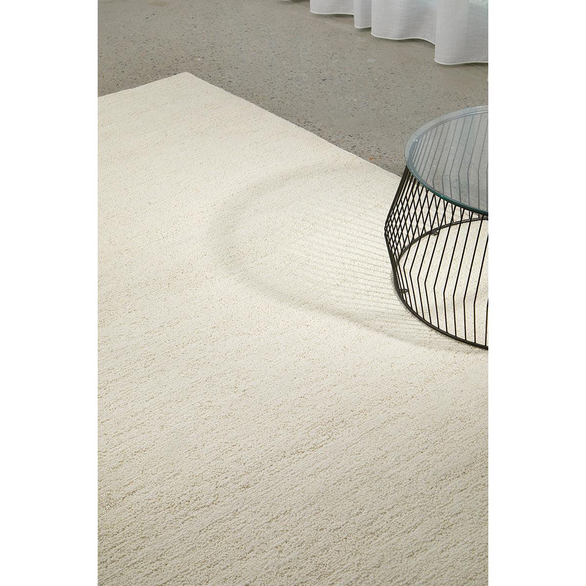 Conscious Loom Embrace Cream Rug featuring solid texture in cream, ivory and beige on light grey, tufted wool