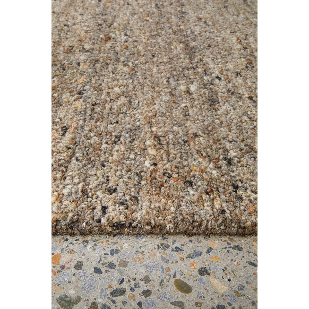 Conscious Loom Embrace Stone Runner Rug featuring shag in tan, beige, taupe and cream on grey background, loomed wool