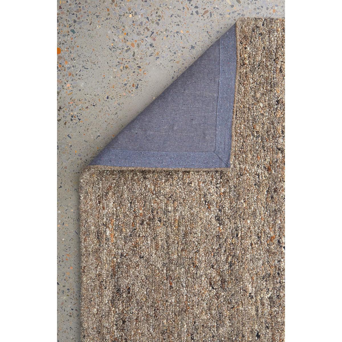 Conscious Loom Embrace Stone Runner Rug featuring speckled texture in beige, taupe, cream on light grey terrazzo, hand-tufted wool