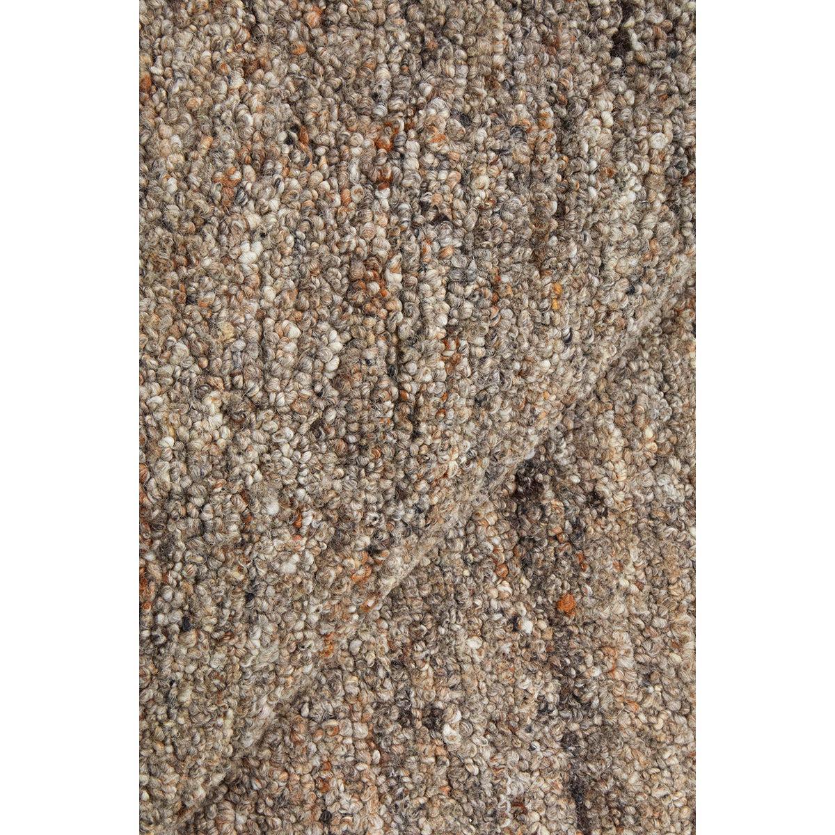 Conscious Loom Embrace Stone Rug featuring boucle in beige, taupe and rust on stone background colour, loom-woven wool