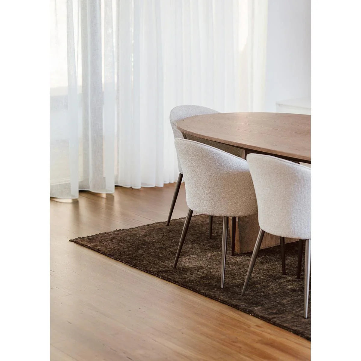 Conscious Loom Kinship Bear Brown Rug featuring textured pattern in brown and beige on tan floor, hand-tufted wool
