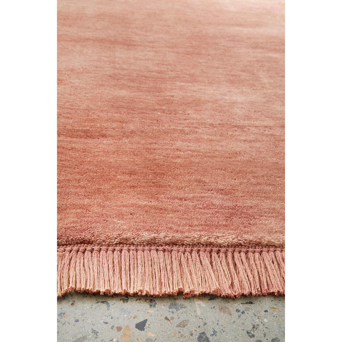 Conscious Loom Kinship Blush Pink Runner Rug featuring blush-pink pile on grey terrazzo background, handwoven wool
