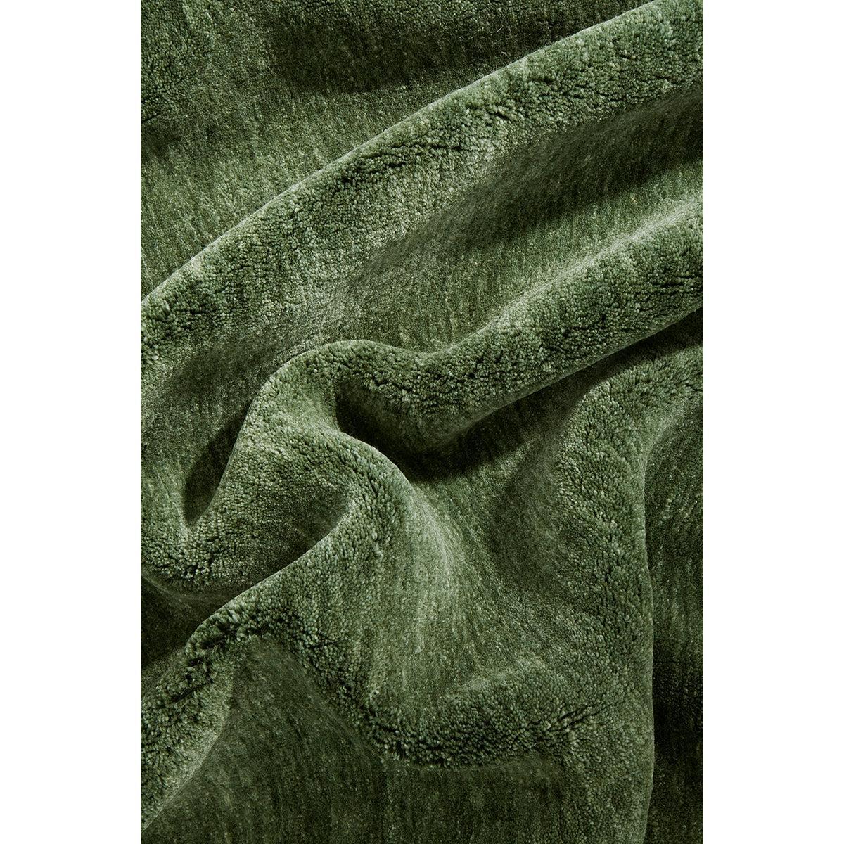 Conscious Loom Kinship Forest Green Runner Rug featuring plush texture in forest green, emerald and olive on sage green background, hand-tufted wool