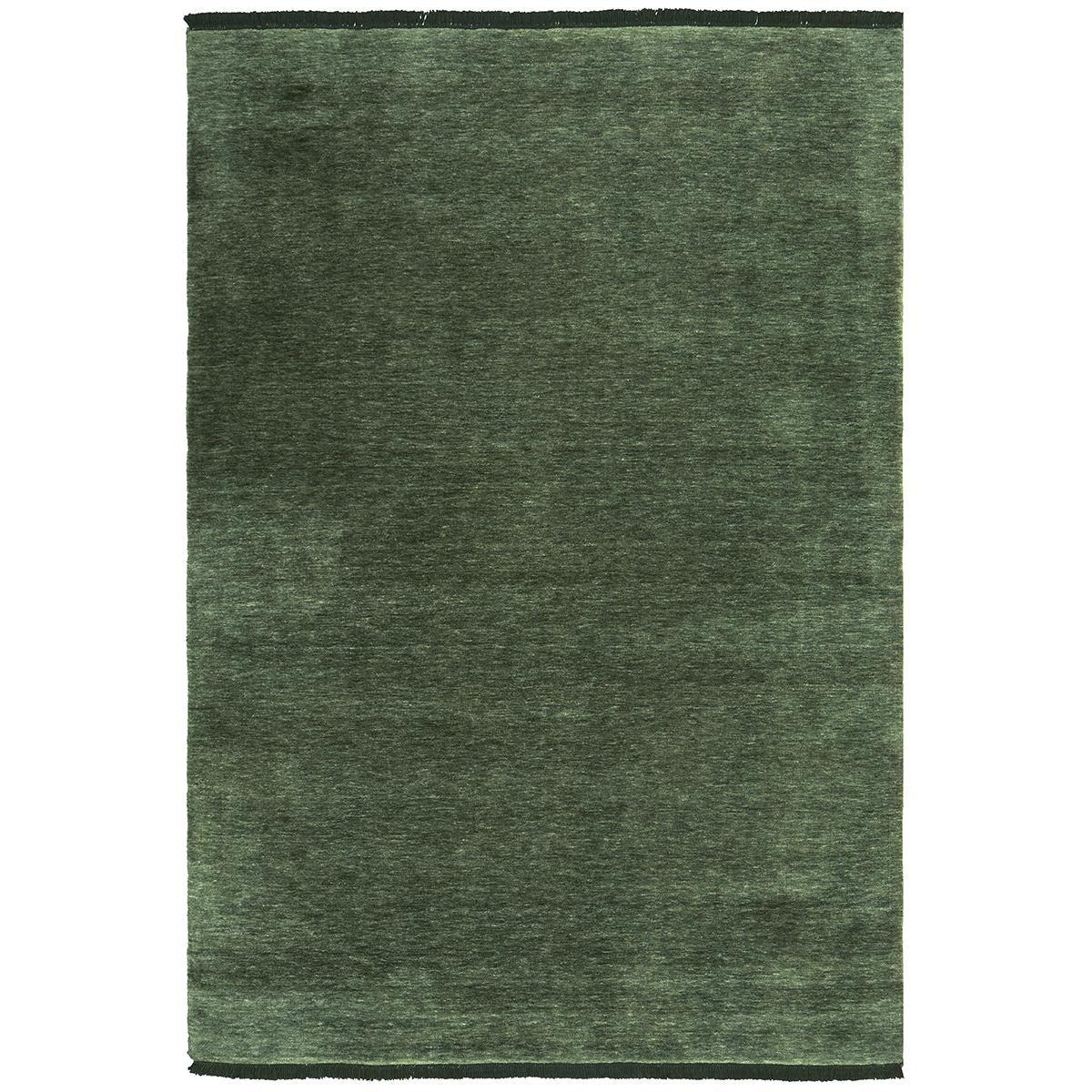 Conscious Loom Kinship Forest Green Rug featuring tonal emerald, olive and moss on white background, hand-loomed wool