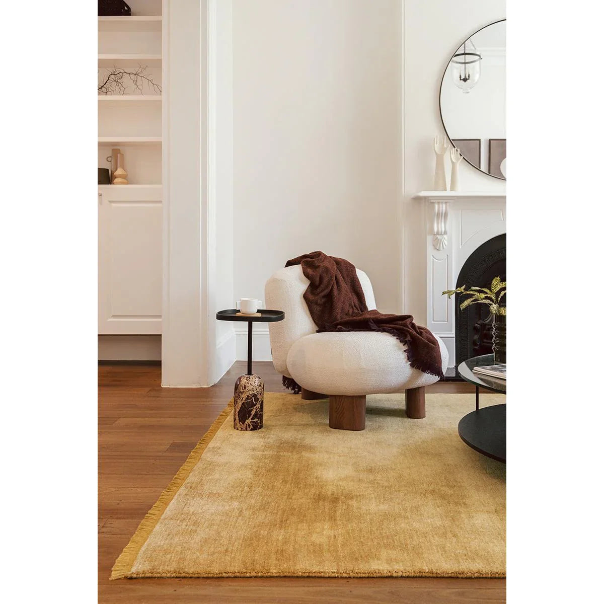Conscious Loom Kinship Honey Rug featuring solid-tone weave in honey yellow on warm cream background, hand-tufted wool.