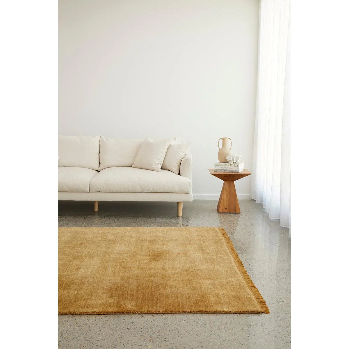 Conscious Loom Kinship Honey Rug featuring solid pattern in honey, ochre, tan on cream background, hand-loomed wool