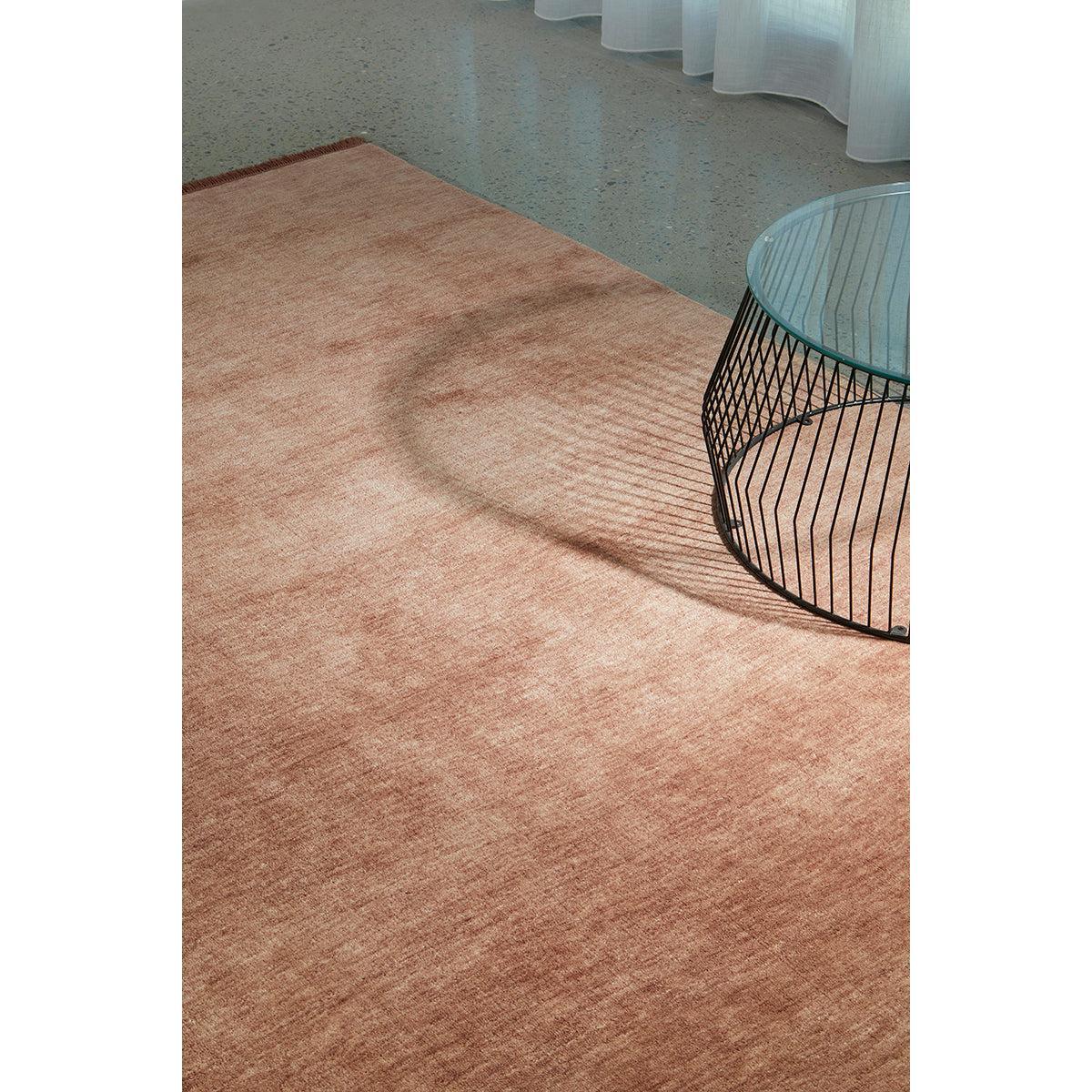 Conscious Loom Kinship Mocha Mousse Rug featuring tonal gradient in mocha and blush on cool grey floor, hand-tufted wool
