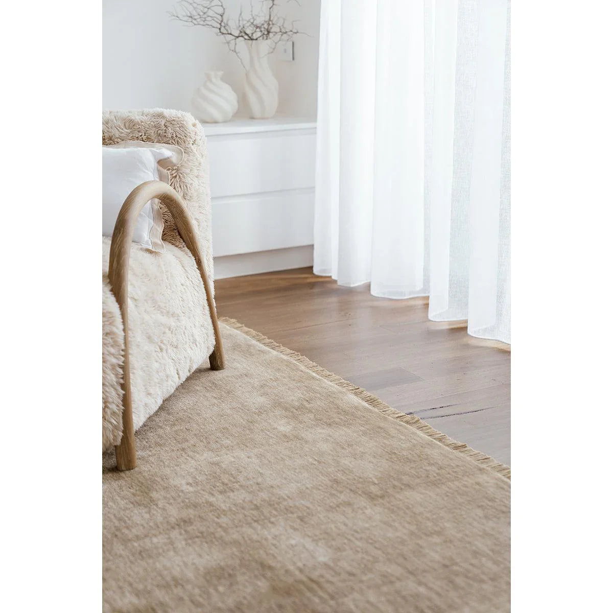 Conscious Loom Kinship Oyster Rug with texture in oyster beige, cream and sand on beige backdrop, hand-tufted wool