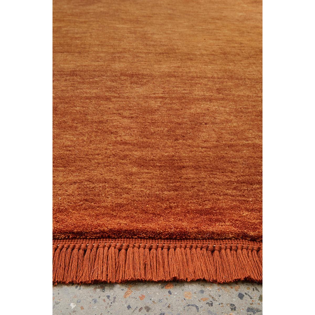 Conscious Loom Kinship Paprika Runner Rug featuring solid-toned paprika orange on white background, hand-loomed wool