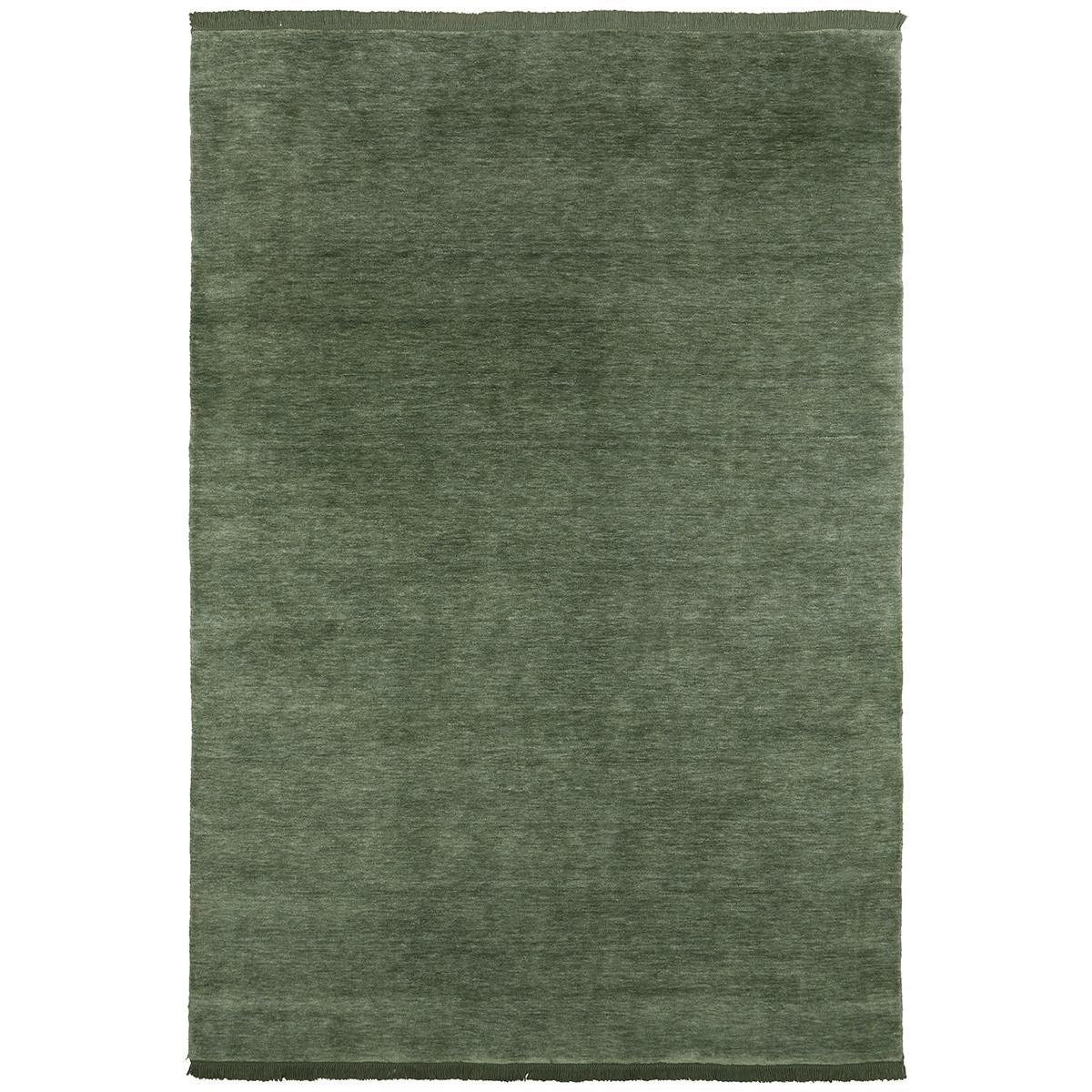 Conscious Loom Kinship Sage Green Rug featuring solid color design in sage green on white background, hand-loomed wool