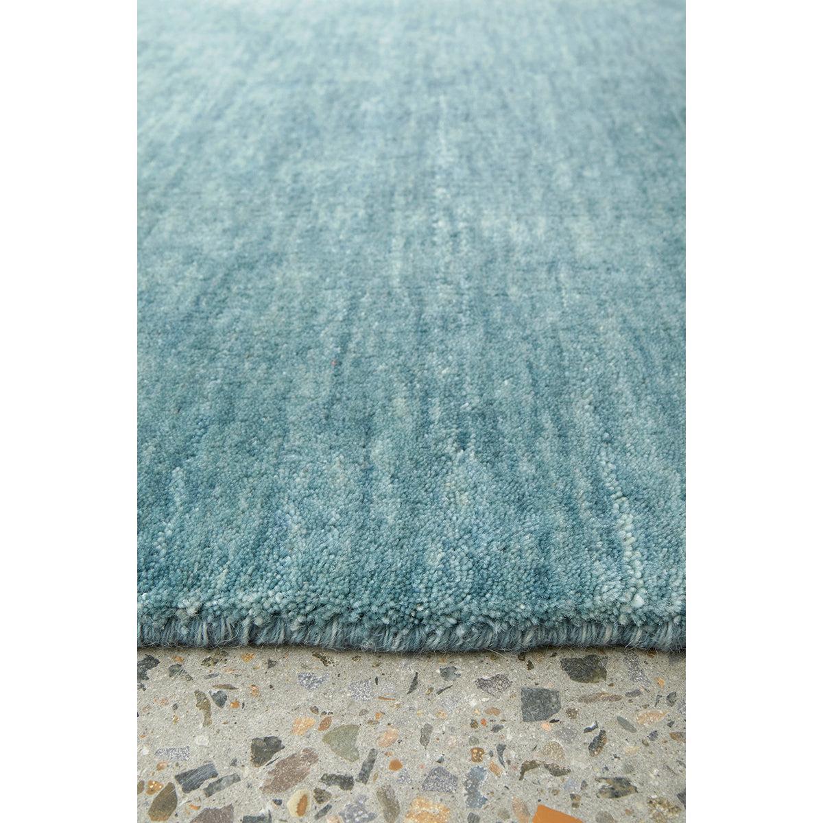 Conscious Loom Kinship Sky Blue Runner Rug with textured solid in sky blue teal turquoise on beige terrazzo tufted wool