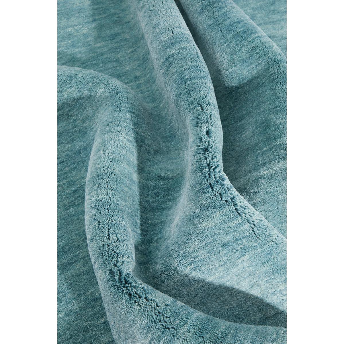 Conscious Loom Kinship Sky Blue Runner Rug with textured pile in sky blue and teal on white background, loom-woven wool
