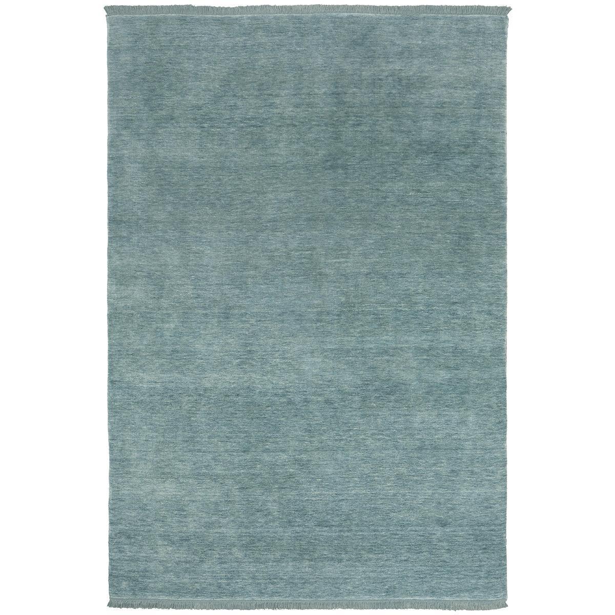 Conscious Loom Kinship Sky Blue Rug featuring a solid-textured look in sky blue, powder blue, teal on white background, hand-woven wool
