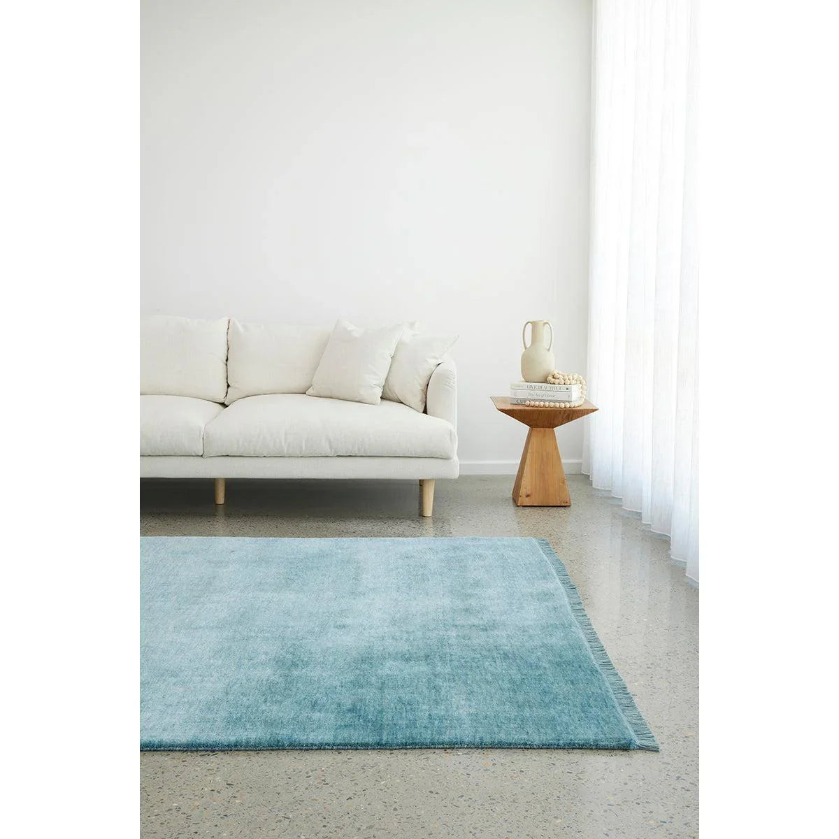 Conscious Loom Kinship Sky Blue Rug featuring solid colour design in sky blue on cream background, hand-tufted wool