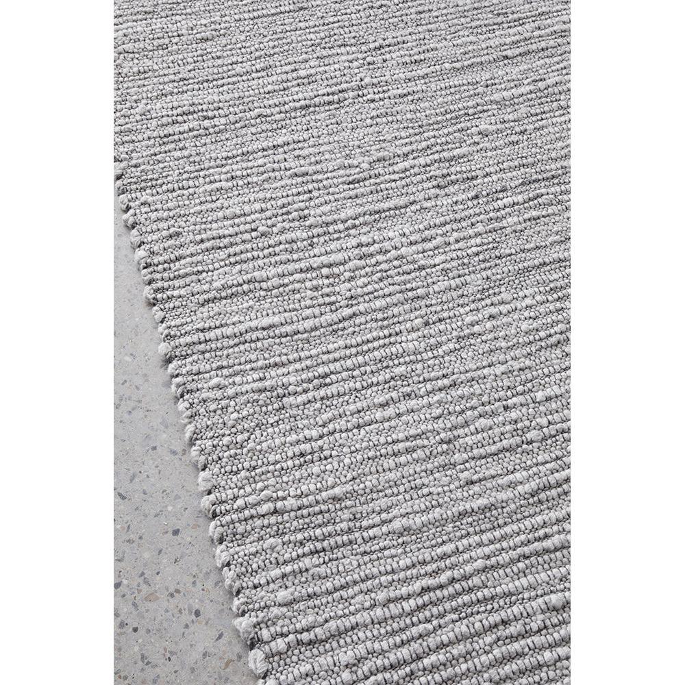 Darren Palmer Bedrock Grey Rug featuring textured boucle in stone, light grey and charcoal on light grey background, machine-woven polypropylene