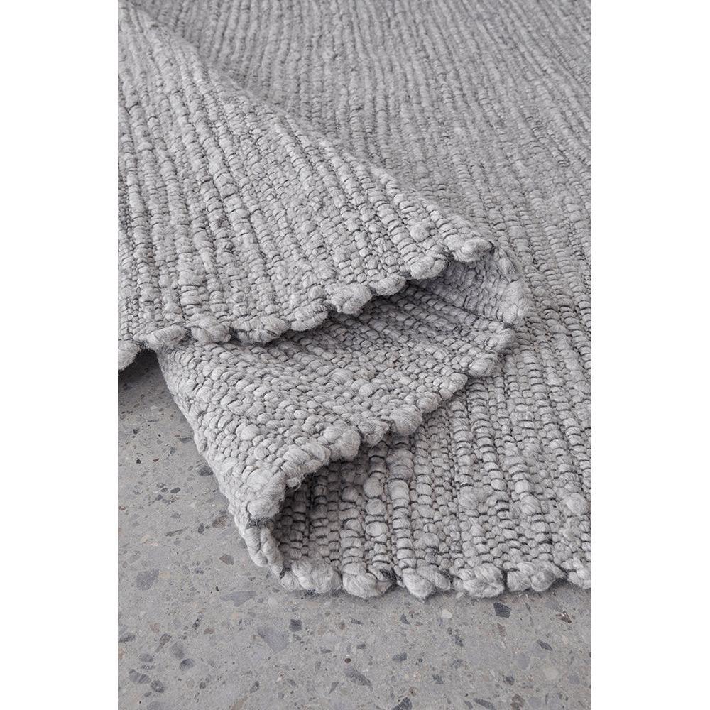 Darren Palmer Bedrock Grey Rug featuring textured loop pile in charcoal grey, slate grey and light grey on light background, powerloomed polypropylene