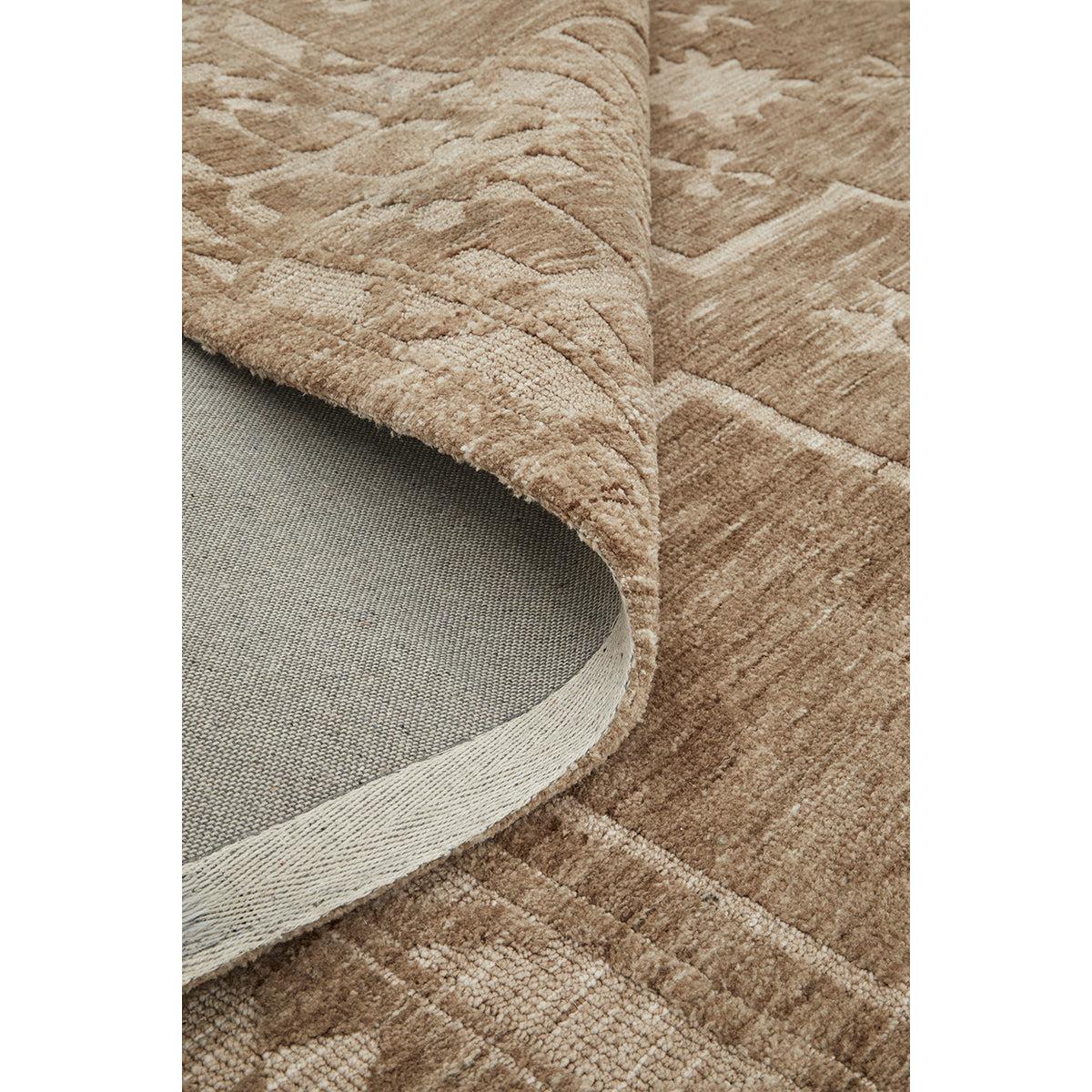Darren Palmer Ceylon Almond Rug featuring almond beige, taupe and cream pattern on white backdrop, hand-tufted wool