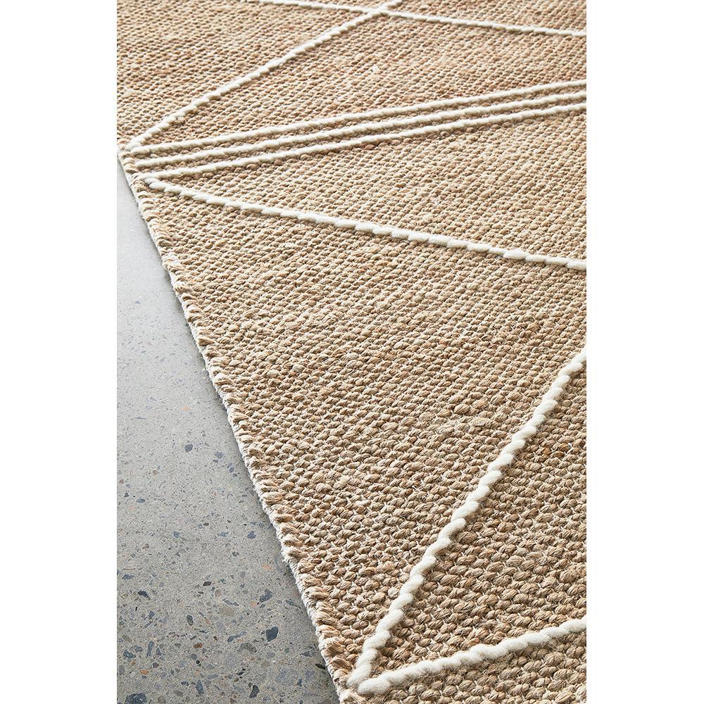 Darren Palmer Earth Natural Rug featuring geometric linework in beige, tan, cream on light grey floor, handwoven jute
