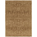 Darren Palmer Malabar Ginger Rug featuring medallion in ginger, tan and beige on white background, machine-made wool