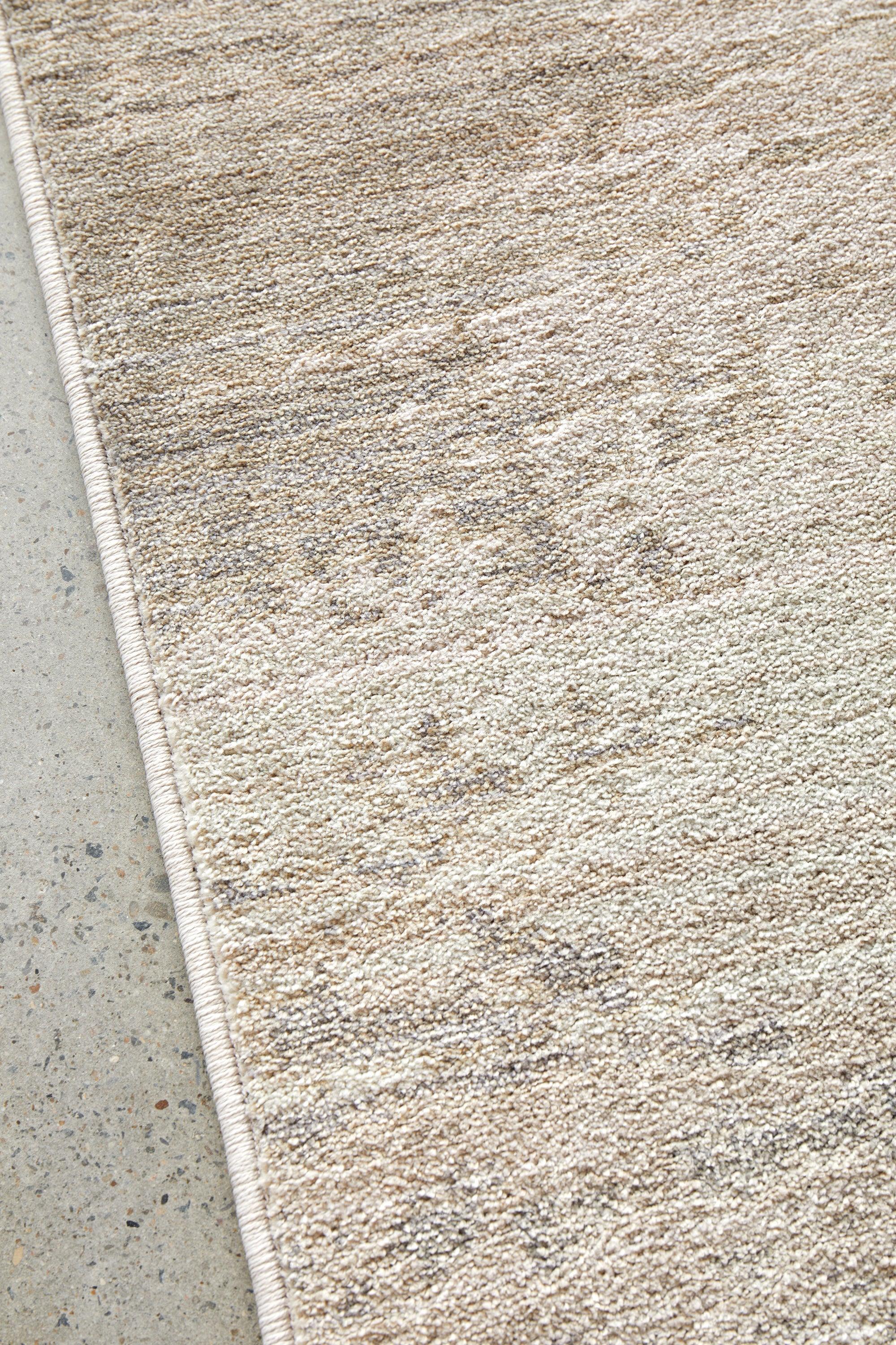 Darren Palmer Morgana Rug featuring abstract marbled pattern in taupe, cream and grey on cream base, machine-made wool