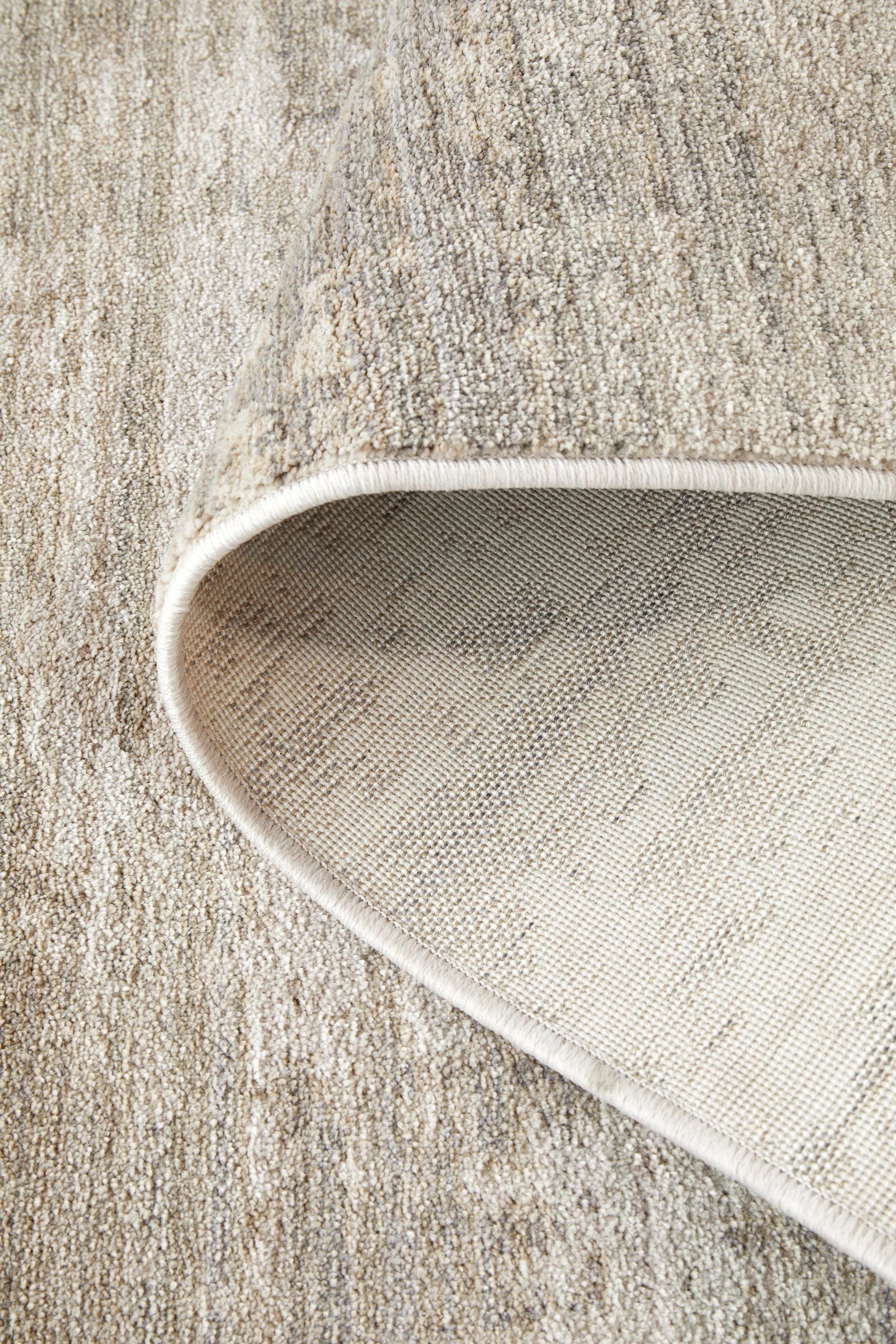 Darren Palmer Morgana Stone Rug featuring texture in stone, beige, taupe and ivory on cream, machine-woven wool