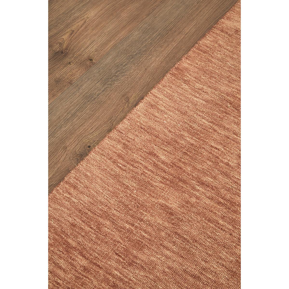 Darren Palmer Origin Clay Runner Rug featuring textured weave in clay and terracotta on warm wood floor, unknown