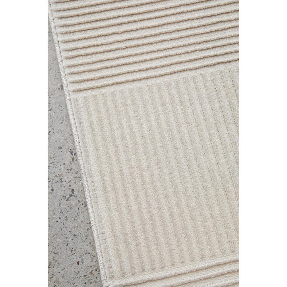 Darren Palmer Raking Linen Runner Rug featuring ribbed texture in cream, beige and taupe on light grey floor, woven linen
