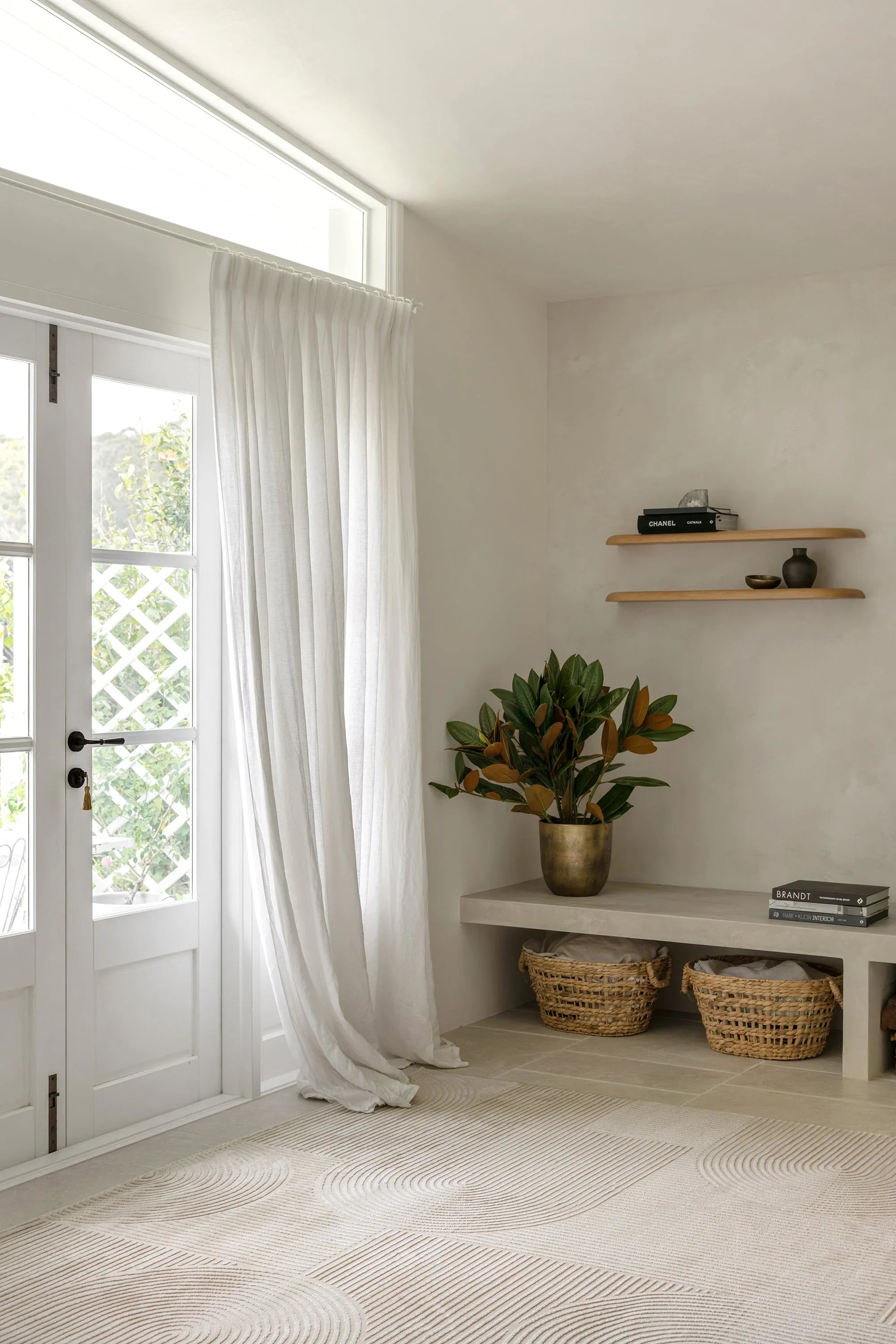 Darren Palmer Raking Linen Rug with circle pattern in cream, beige and taupe on ivory background, hand-loomed linen