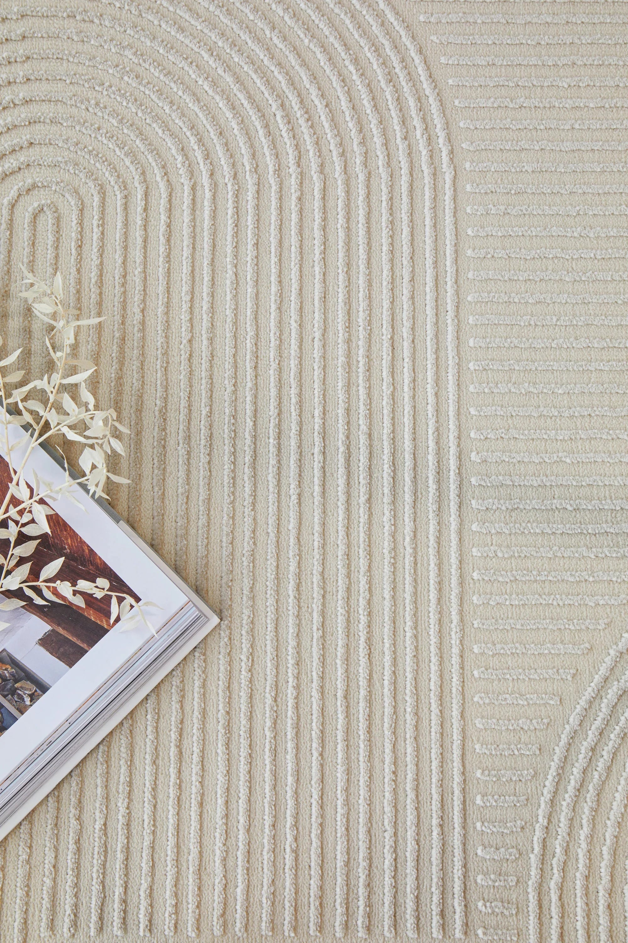 Darren Palmer Raking Linen Rug featuring ribbed arc pattern in cream, ivory and beige on beige background, woven linen