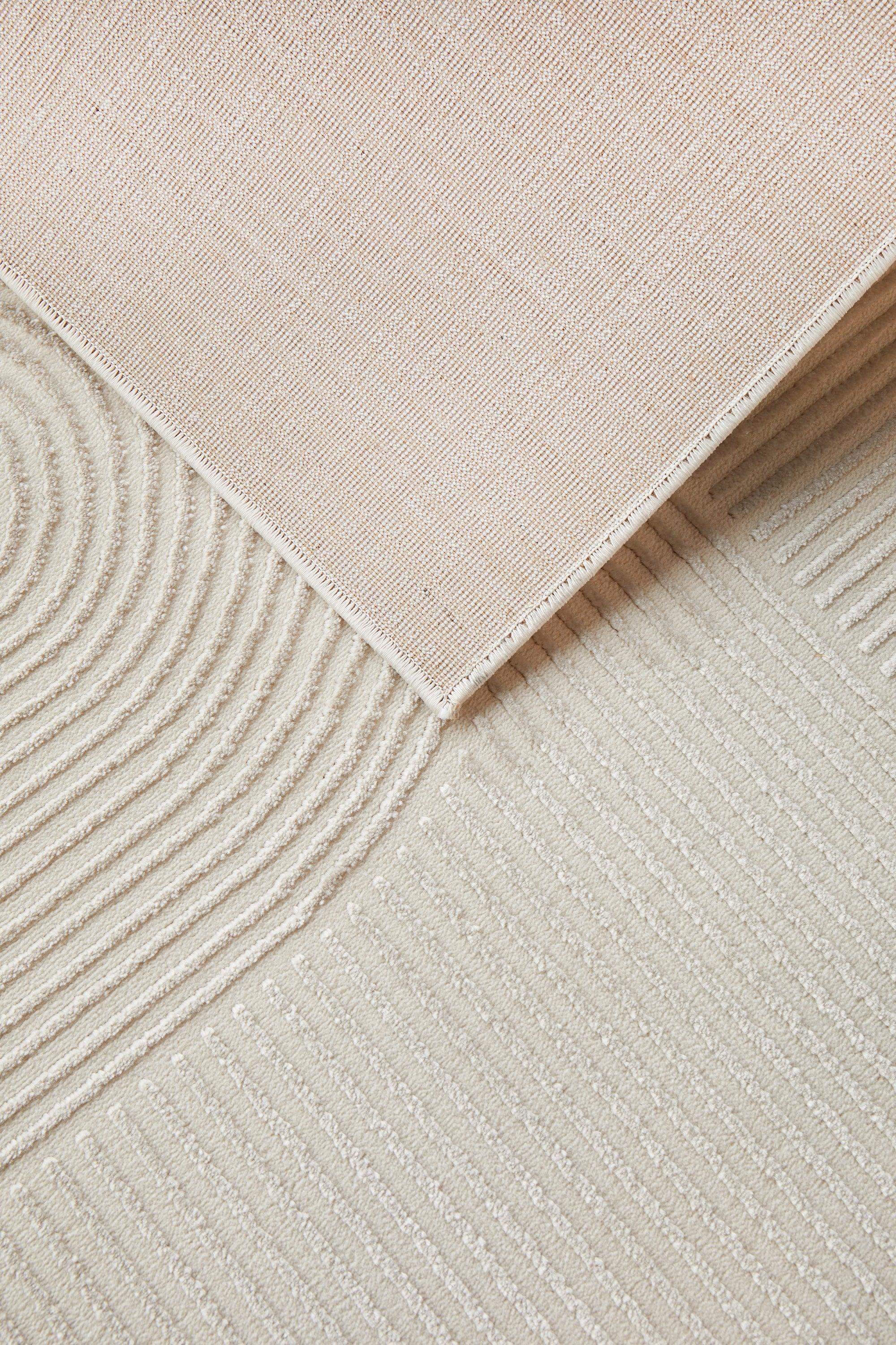 Darren Palmer Raking Linen Rug featuring stripe pattern in beige cream and ivory on white background, hand-tufted linen