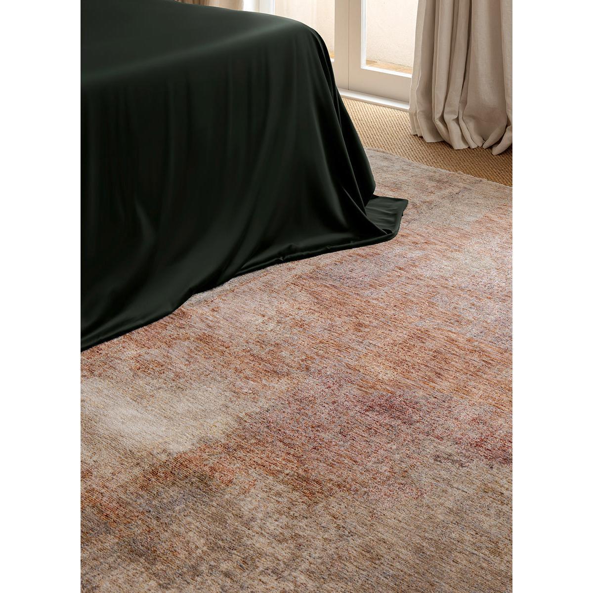 Darren Palmer Sierra Dusk Rug with abstract pattern in peach, rust, taupe and cream on warm beige background, wool