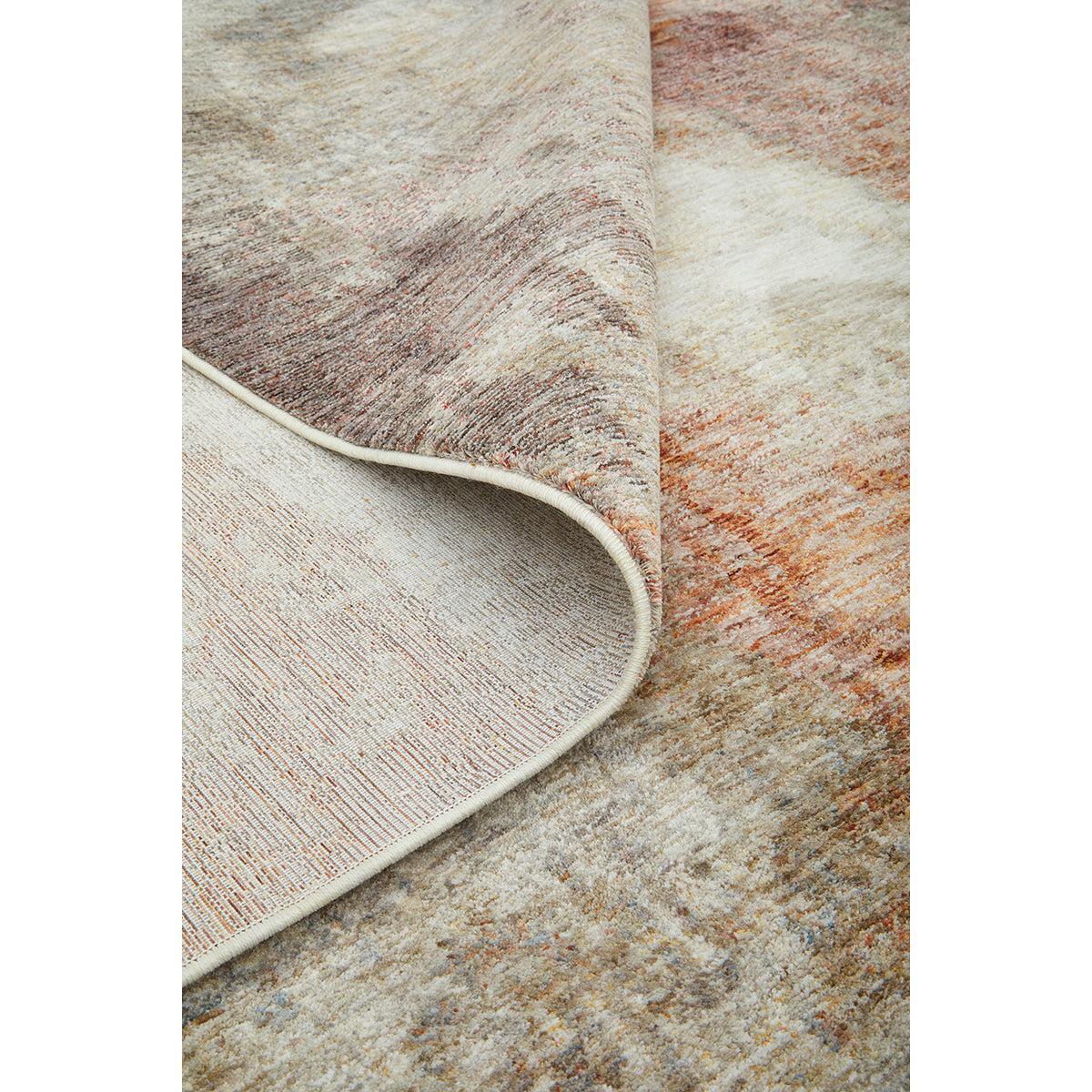 Darren Palmer Sierra Dusk Rug featuring abstract tonal pattern in cream, beige, taupe, peach and rust on ivory