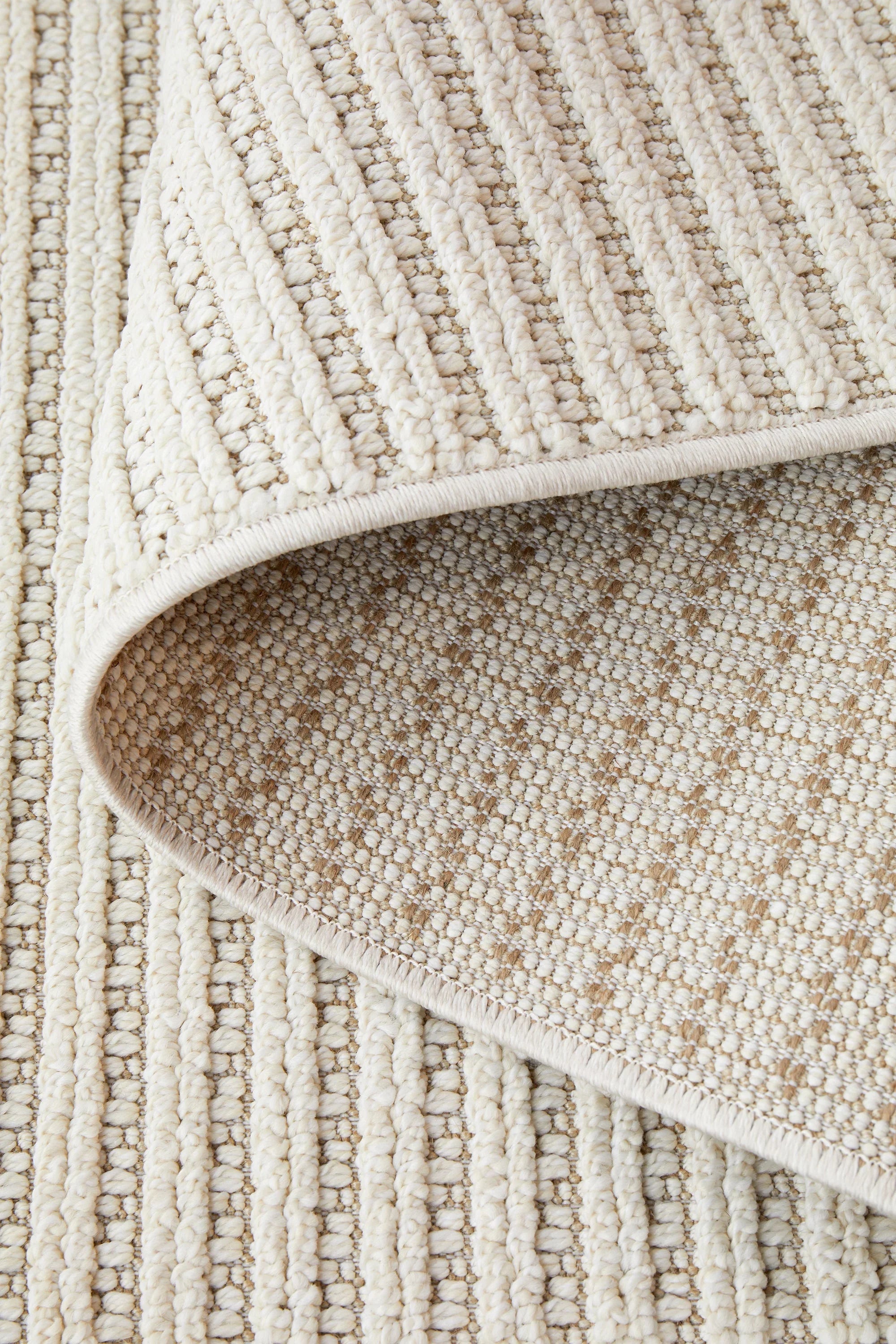 Darren Palmer Sandridge Cream Indoor/Outdoor Rug featuring ribbed stripes in cream, ivory and beige on cream background, loomed polypropylene