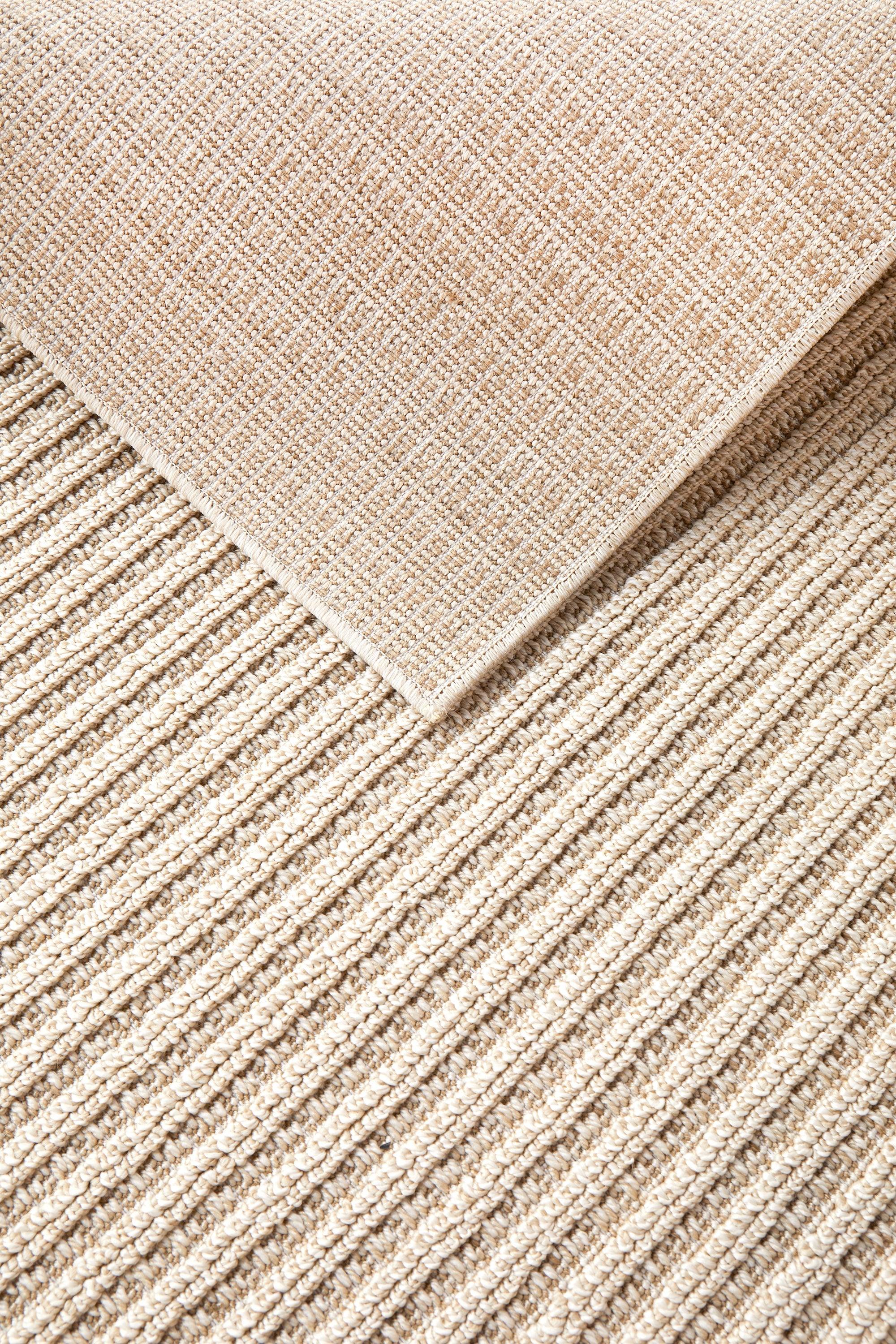 Darren Palmer Sandridge Taupe Rug featuring textured weave in taupe, beige and cream on taupe backdrop, woven polypropylene