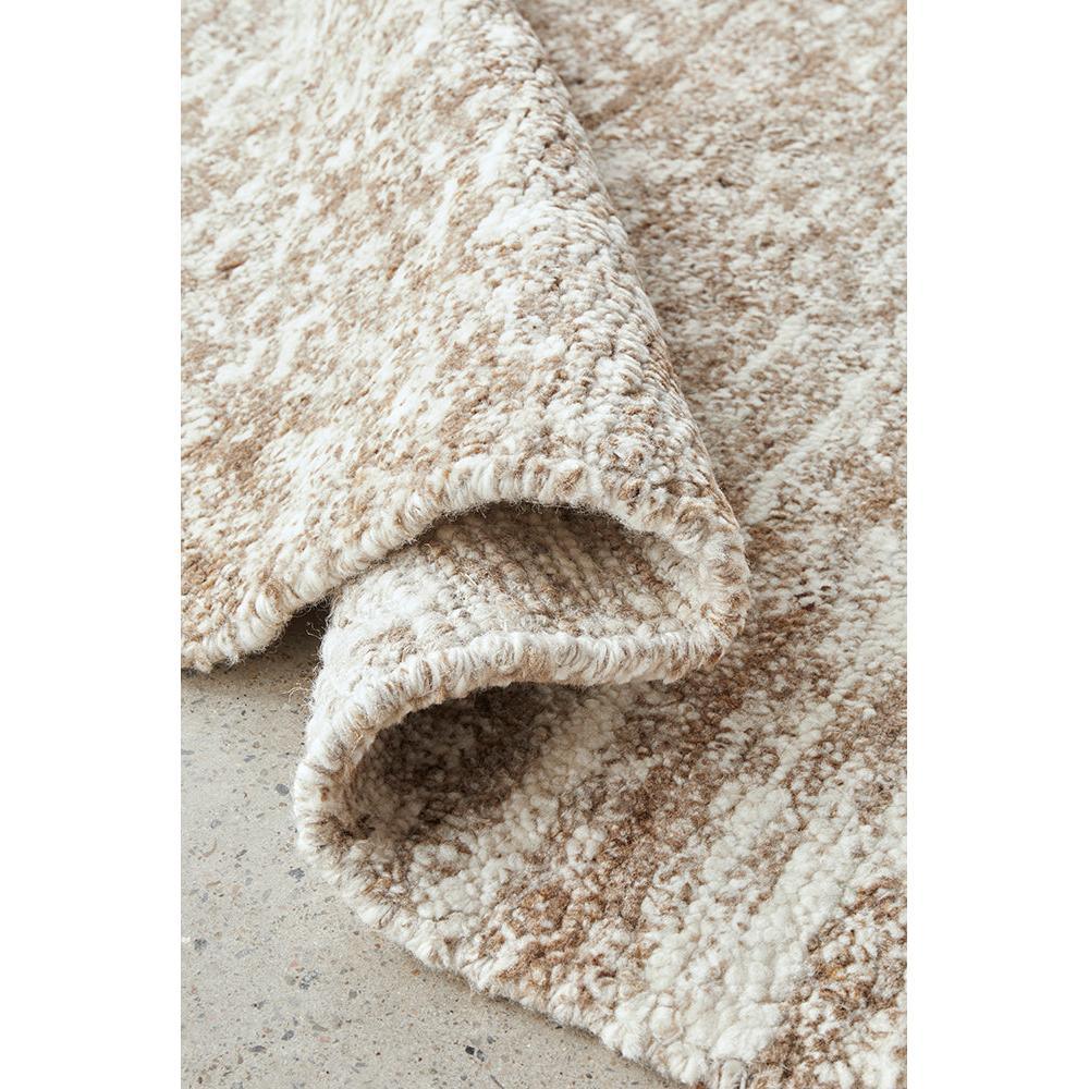 Darren Palmer Travertine Brown rug featuring textured shag in cream, beige and tan on white background, hand-tufted wool