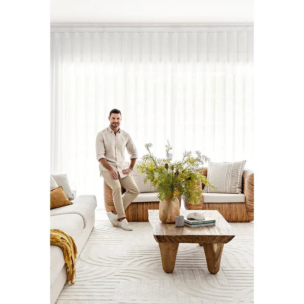 Darren Palmer Zen White Rug featuring curved pattern in cream, taupe and pale grey on cream base, machined polyester