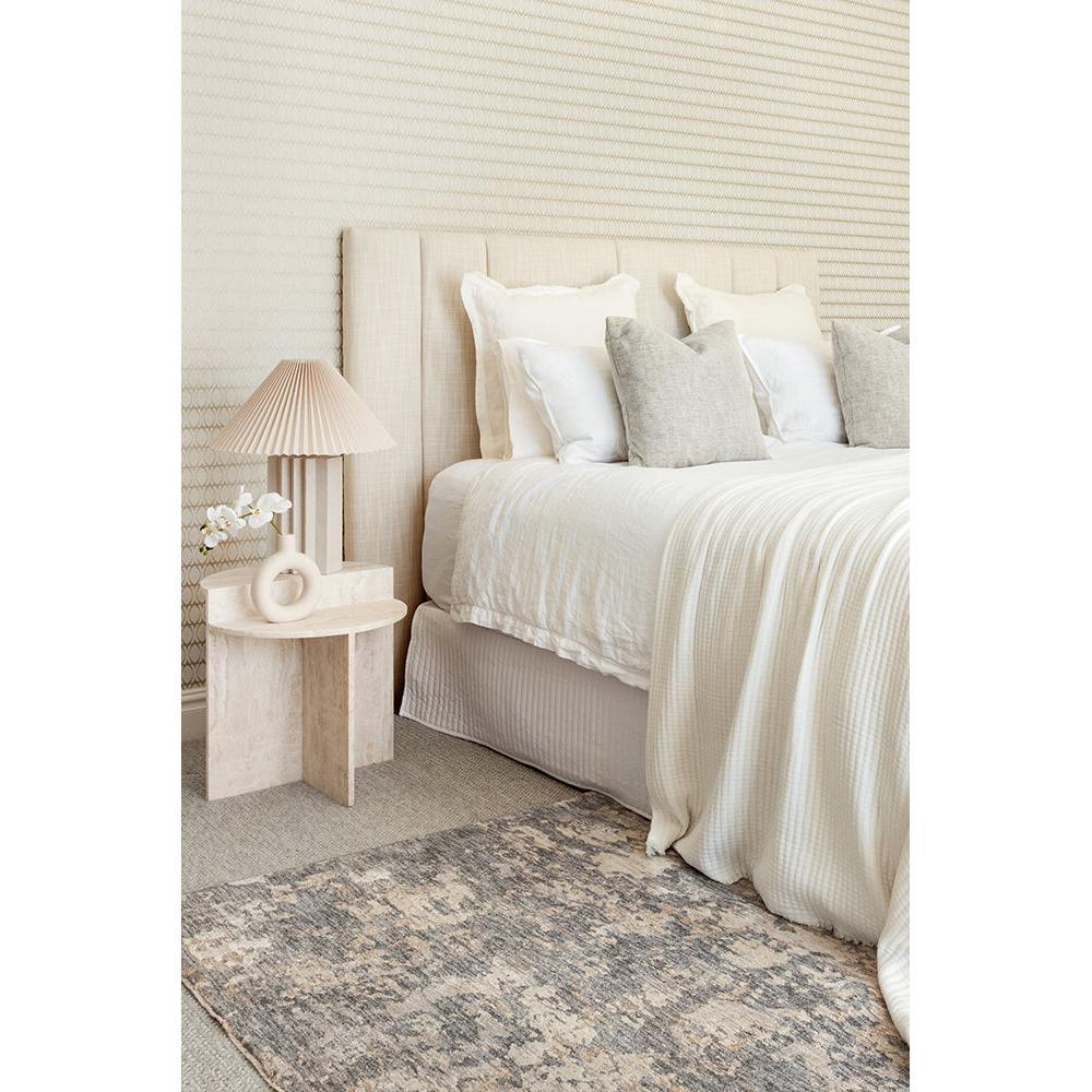Emma Blomfield Haze Slate Rug featuring softly abstract slate blue and ivory pattern on beige background, machine-woven wool