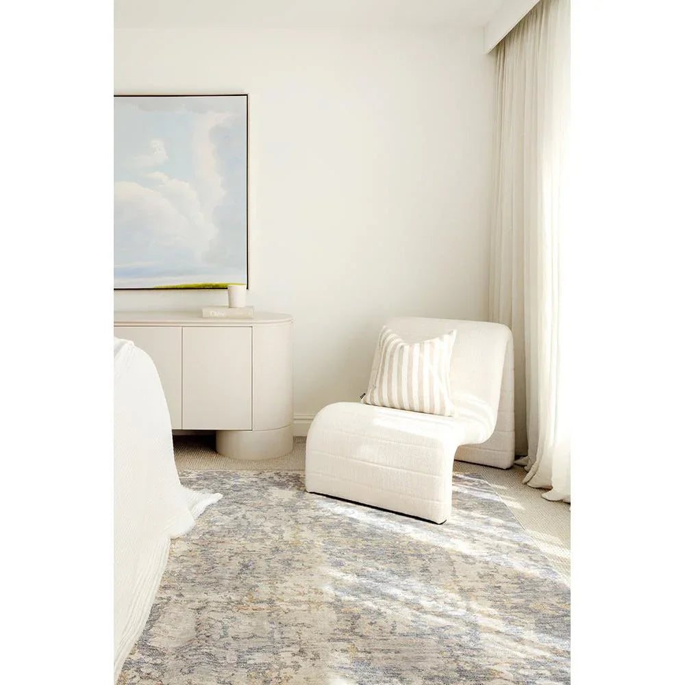 Emma Blomfield Haze Slate Rug with abstract pattern in slate blue-grey and cream on ivory background, tufted wool