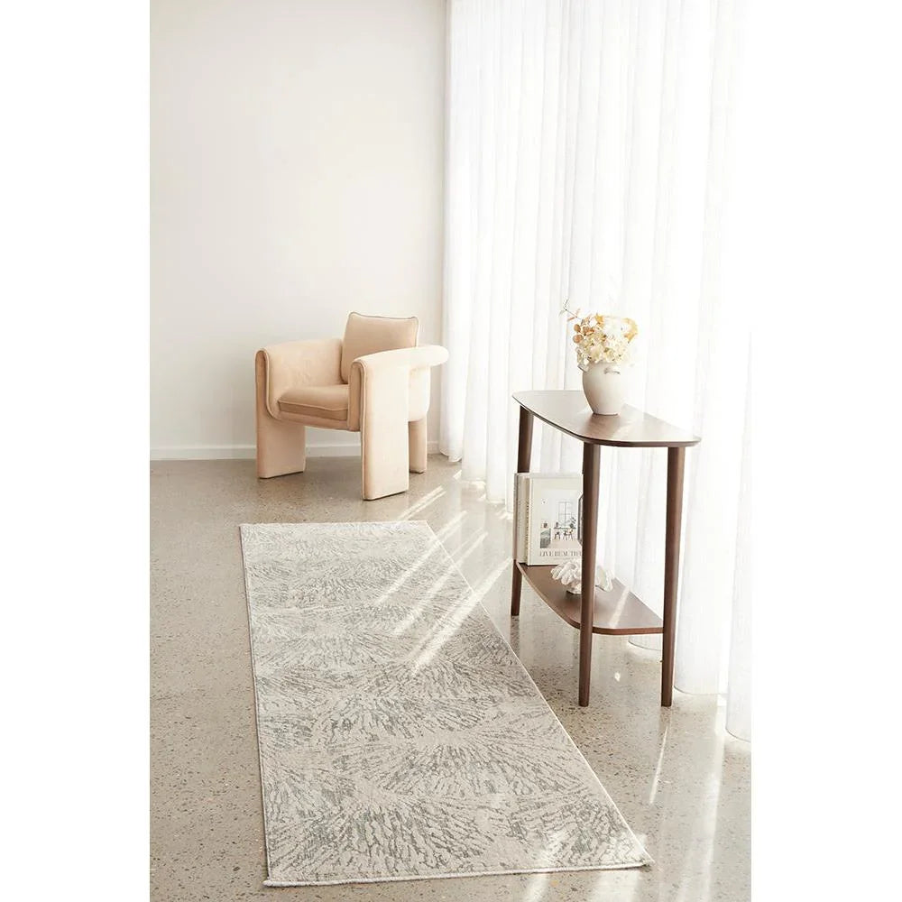 Emma Blomfield Plume Frost Runner Rug featuring pattern in soft grey, ivory and cream on pale cream background, machined wool