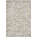 Emma Blomfield Plume Frost Rug featuring plume pattern in blue-grey and cream on ivory background, hand-tufted wool